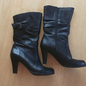 Leather heeled boots.Buckle &crisscrossed details